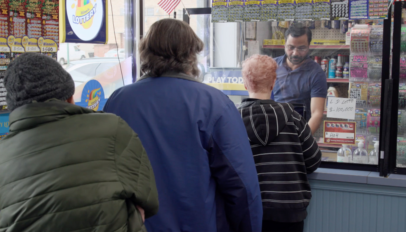 People queuing to buy lottery tickets.