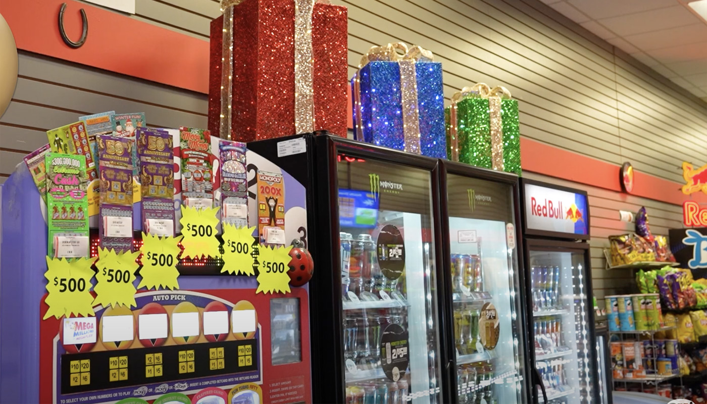 A lottery retailer with Christmas decorations.