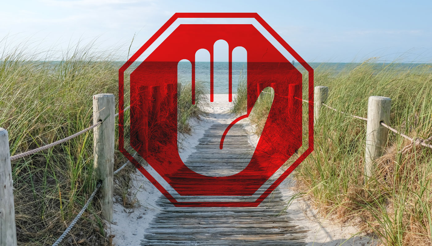 A red stop sign over an image of a Florida beach.