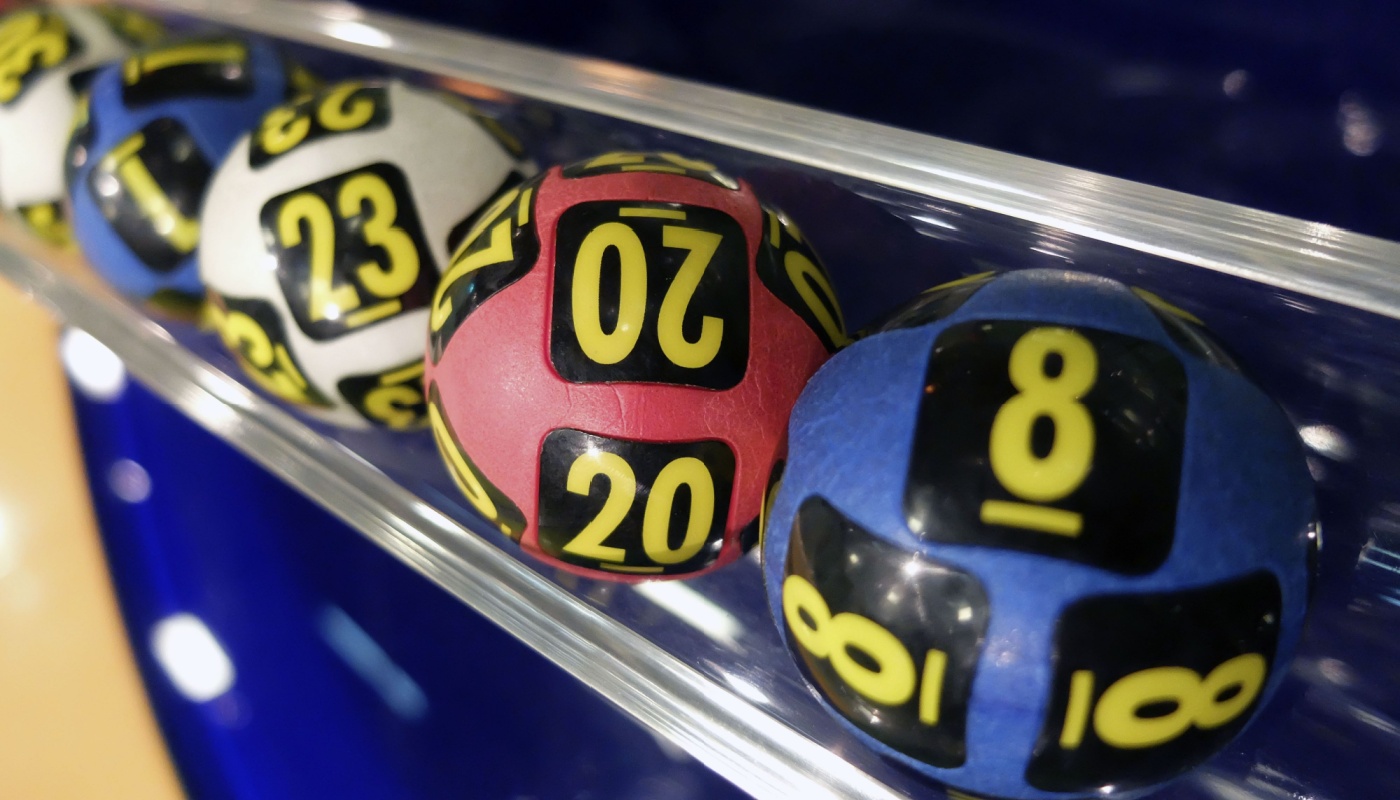 Lottery balls inside a lottery machine.