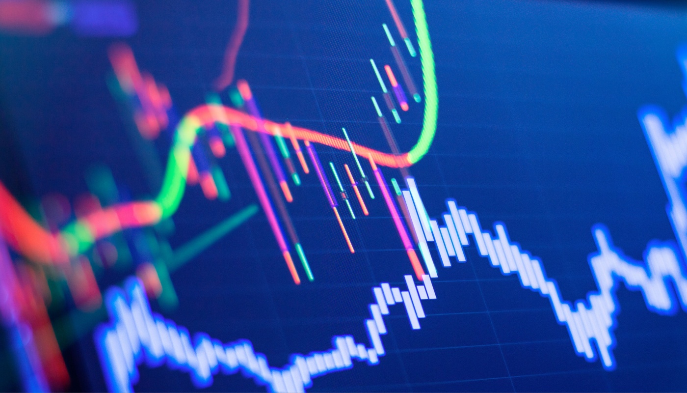 A screen displaying investment graphs.