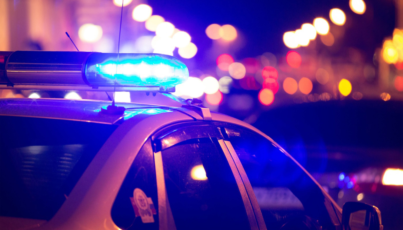 A police car with their flashing lights.