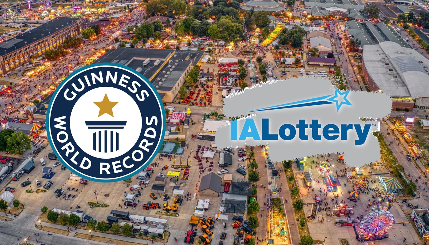 An aerial view of the Iowa State Fairgrounds with the Guinness World Records and Iowa Lottery scratch-offs logos.