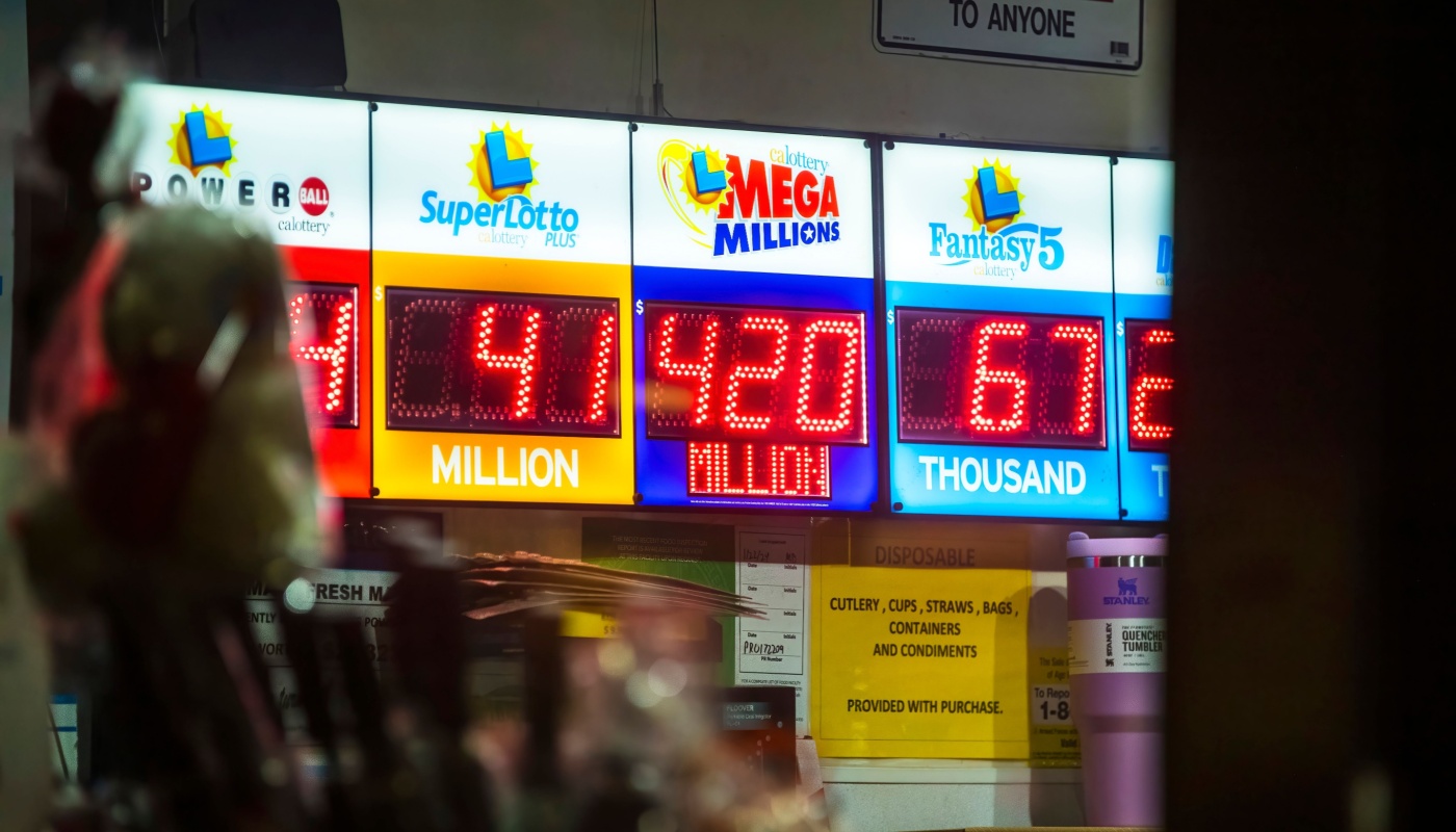 A led sign on a lottery retailer displaying the jackpot for Powerball, California SuperLotto, Mega Millions, and Fantasy 5.