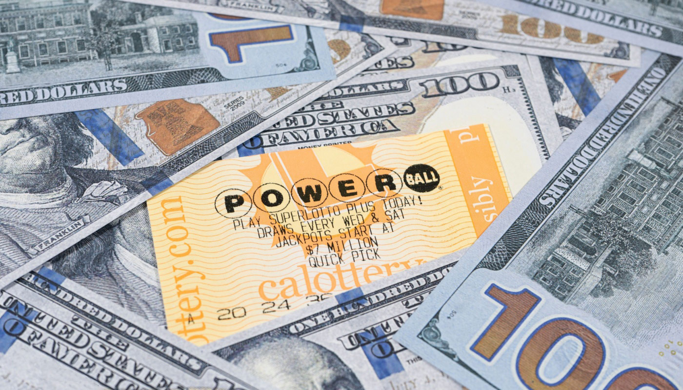 A Powerball ticket surrounded by dollar bills.