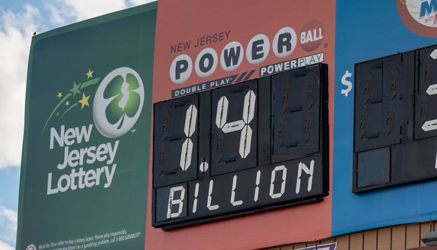 A New Jersey Lottery billboard displaying a $1.4 billion Powerball jackpot.