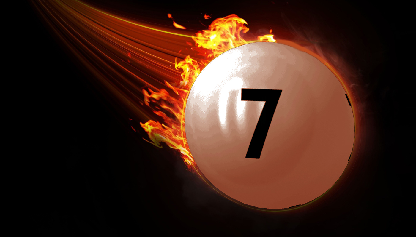 A lottery ball with the number 7, on fire.