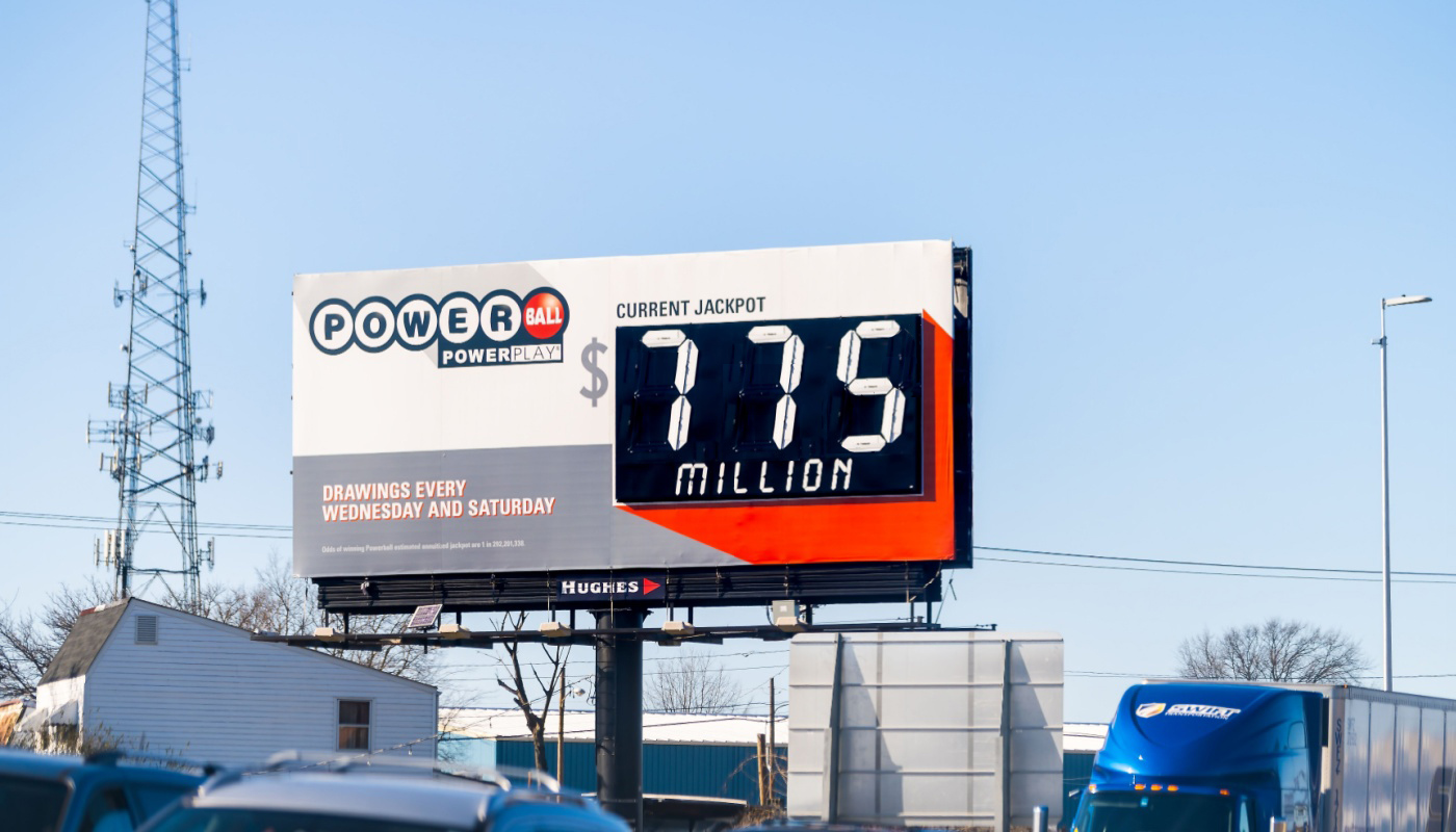 A Powerball billboard displaying a $775 million jackpot.