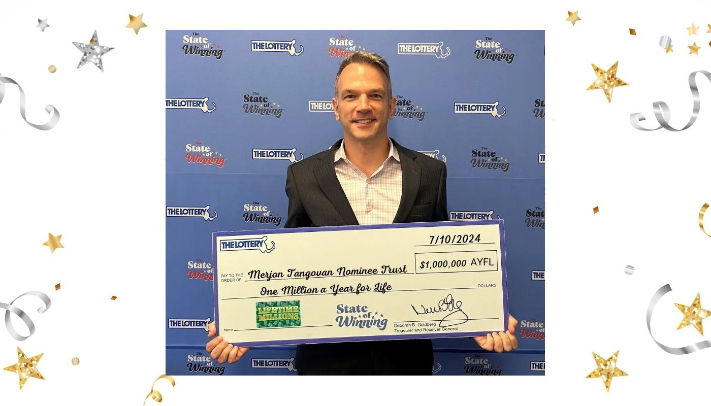 A Massachusetts Lottery check for $1 million a year for life, presented to the "Merjon Tangovan Nominee Trust of Boston".