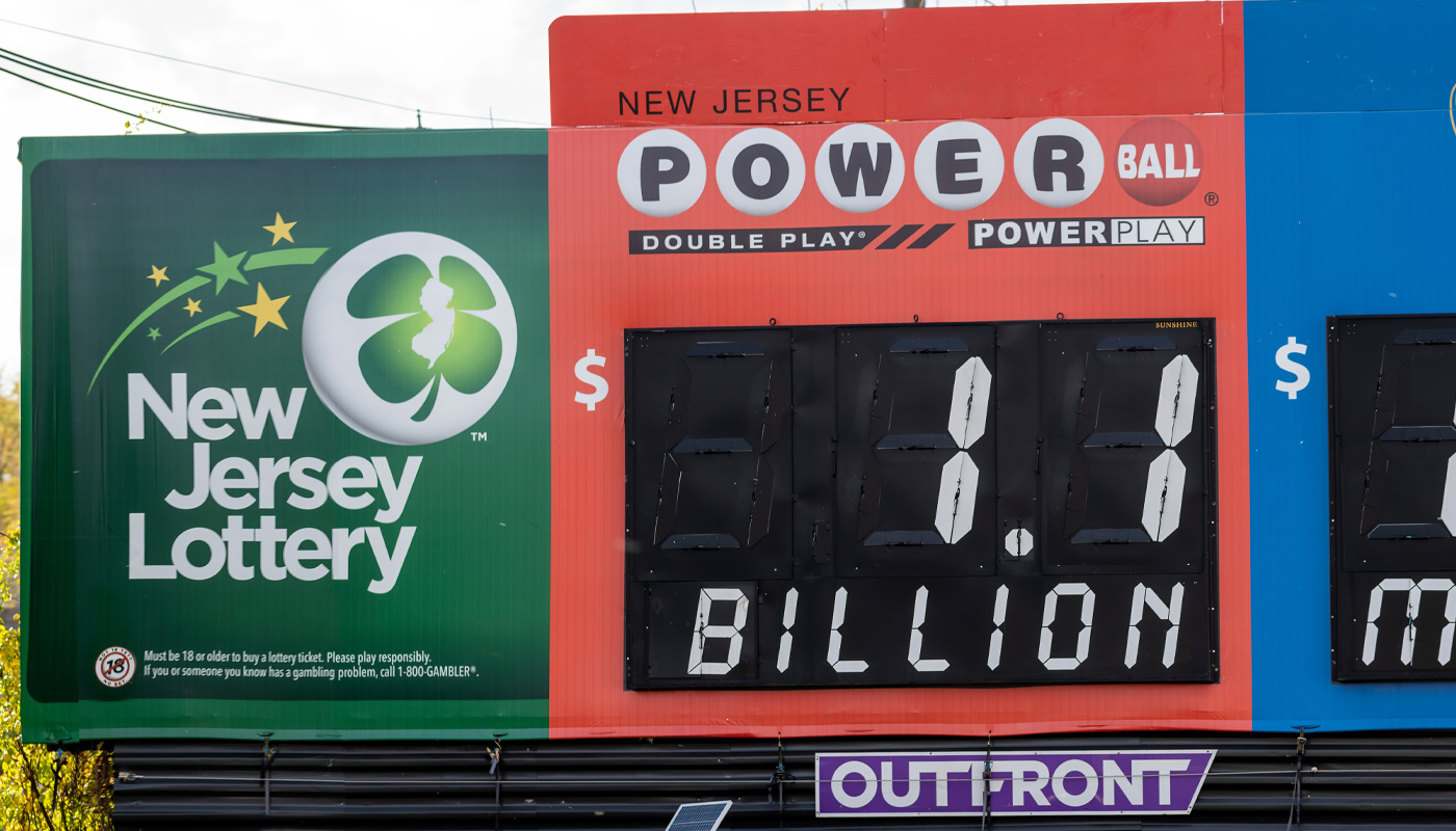 A New Jersey Lottery billboard displaying a $1.1 billion Powerball jackpot.