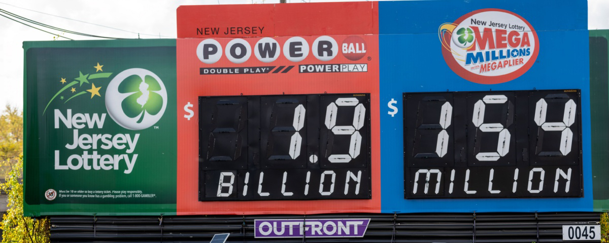 A billboard displaying the Powerball and Mega Millions jackpots.