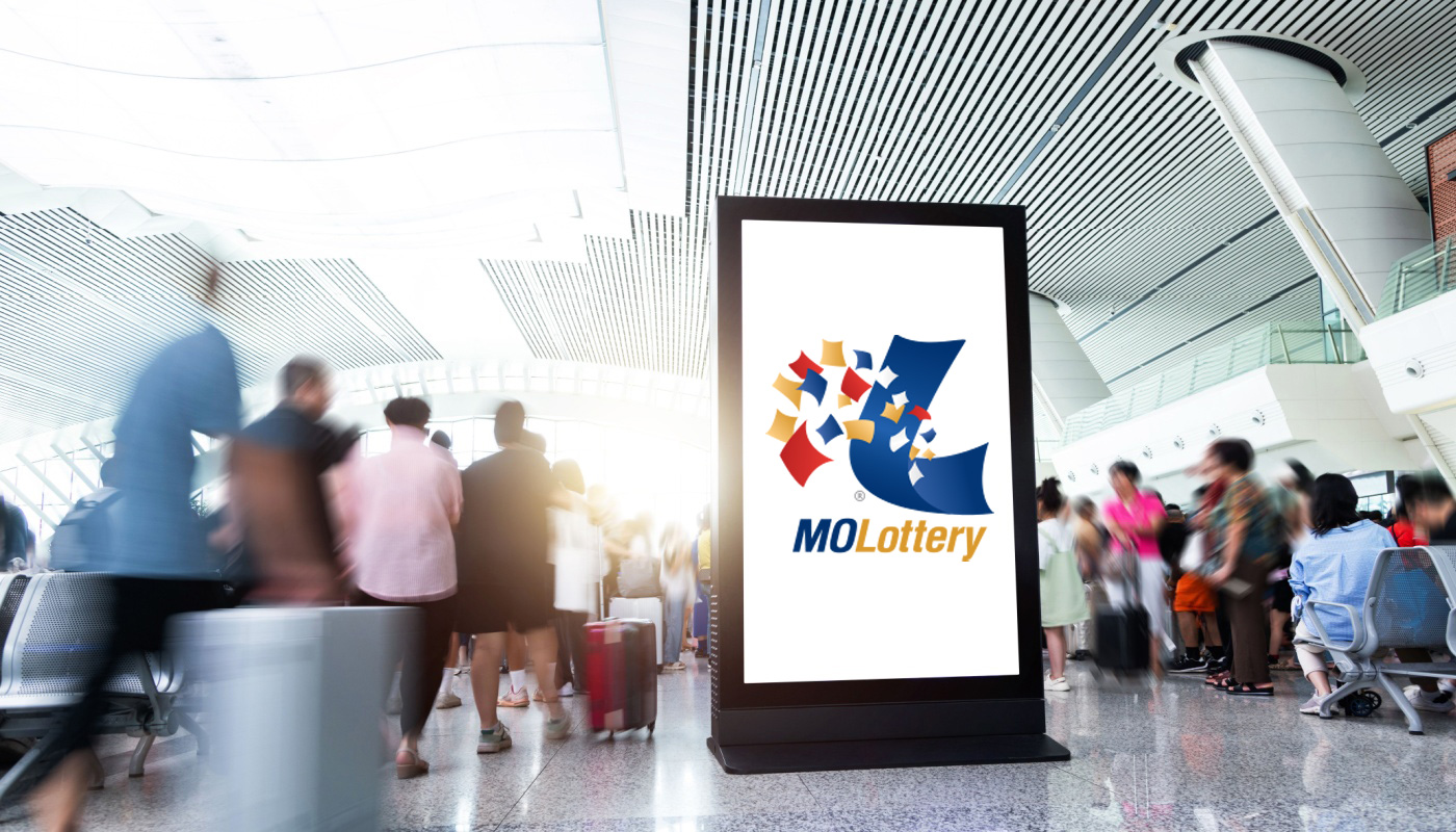 An ad display unit with the logo of the Missouri Lottery.