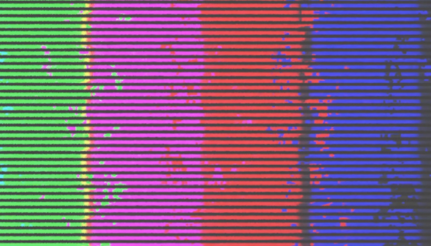 An old and distorted TV screen testing signal.