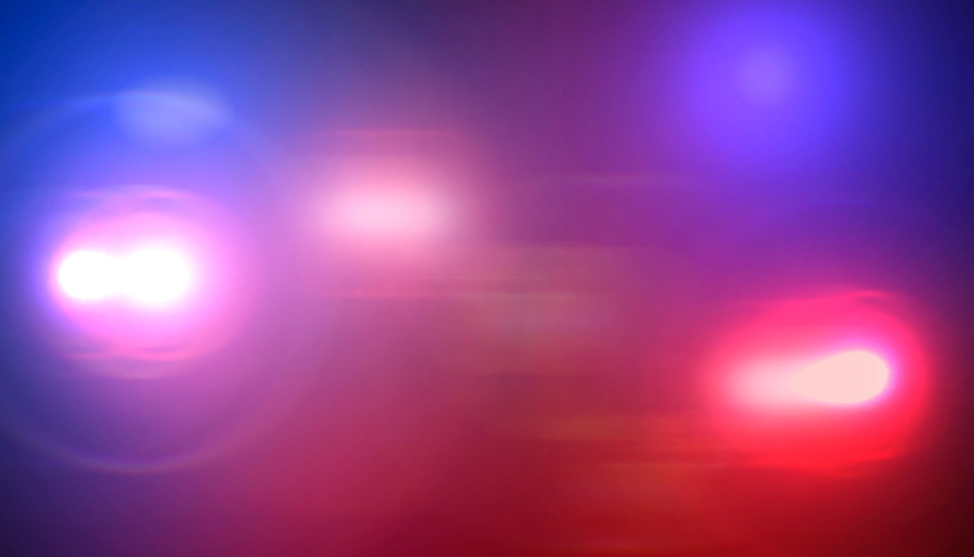 Flashing police lights in the night.