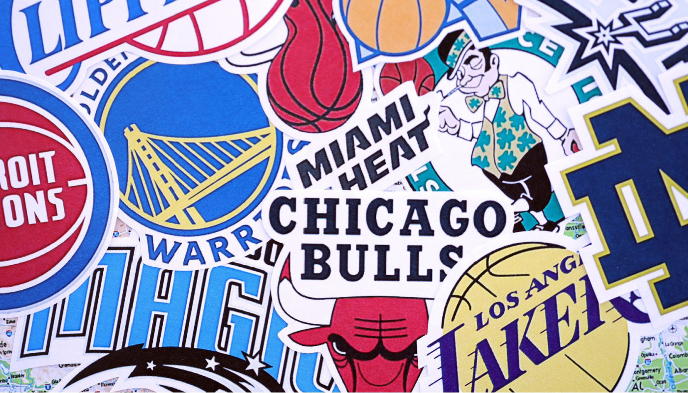 The logos of multiple NBA teams.