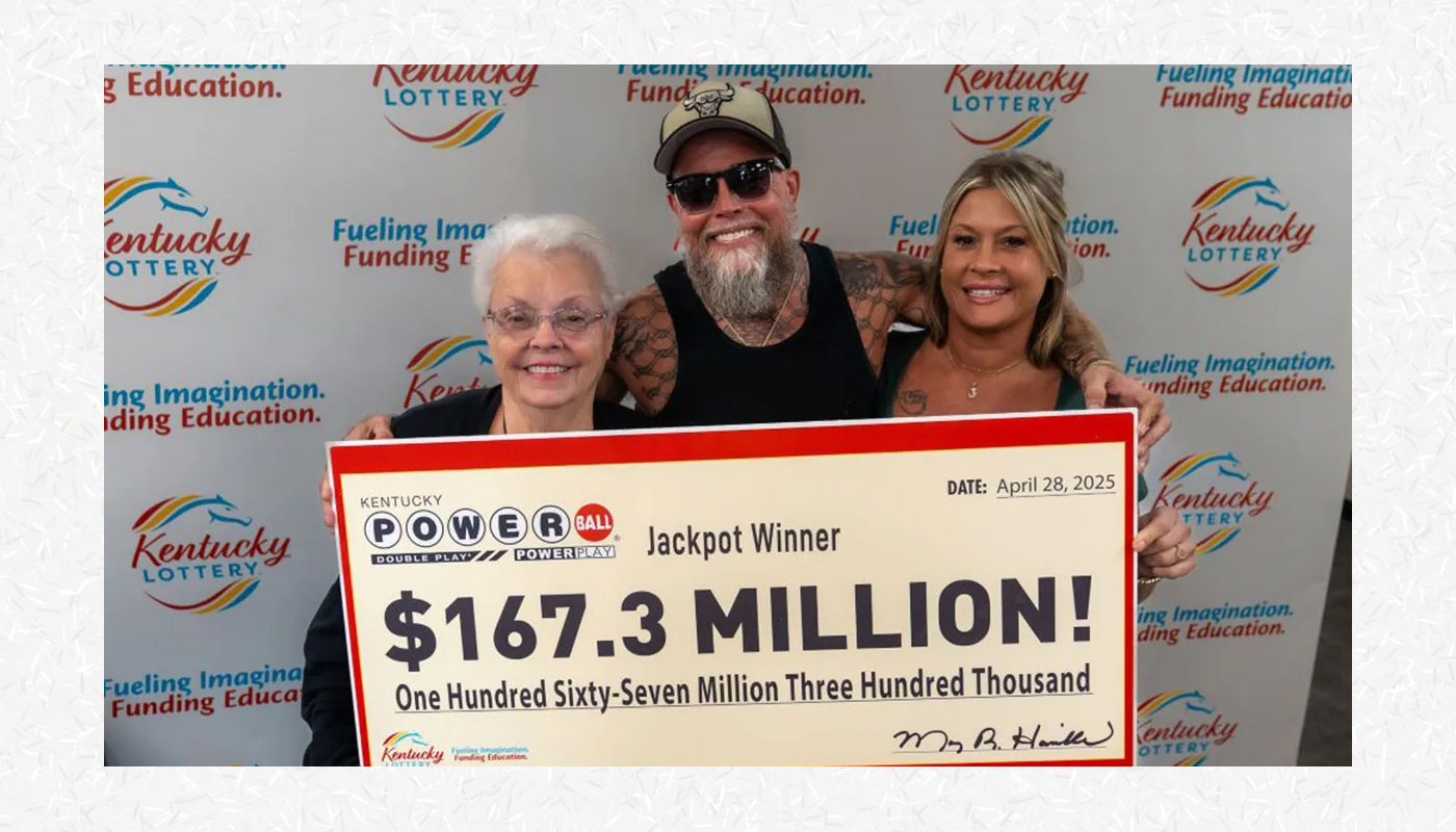 James Farthing holding his $167.3 million Kentucky Lottery Powerball check.