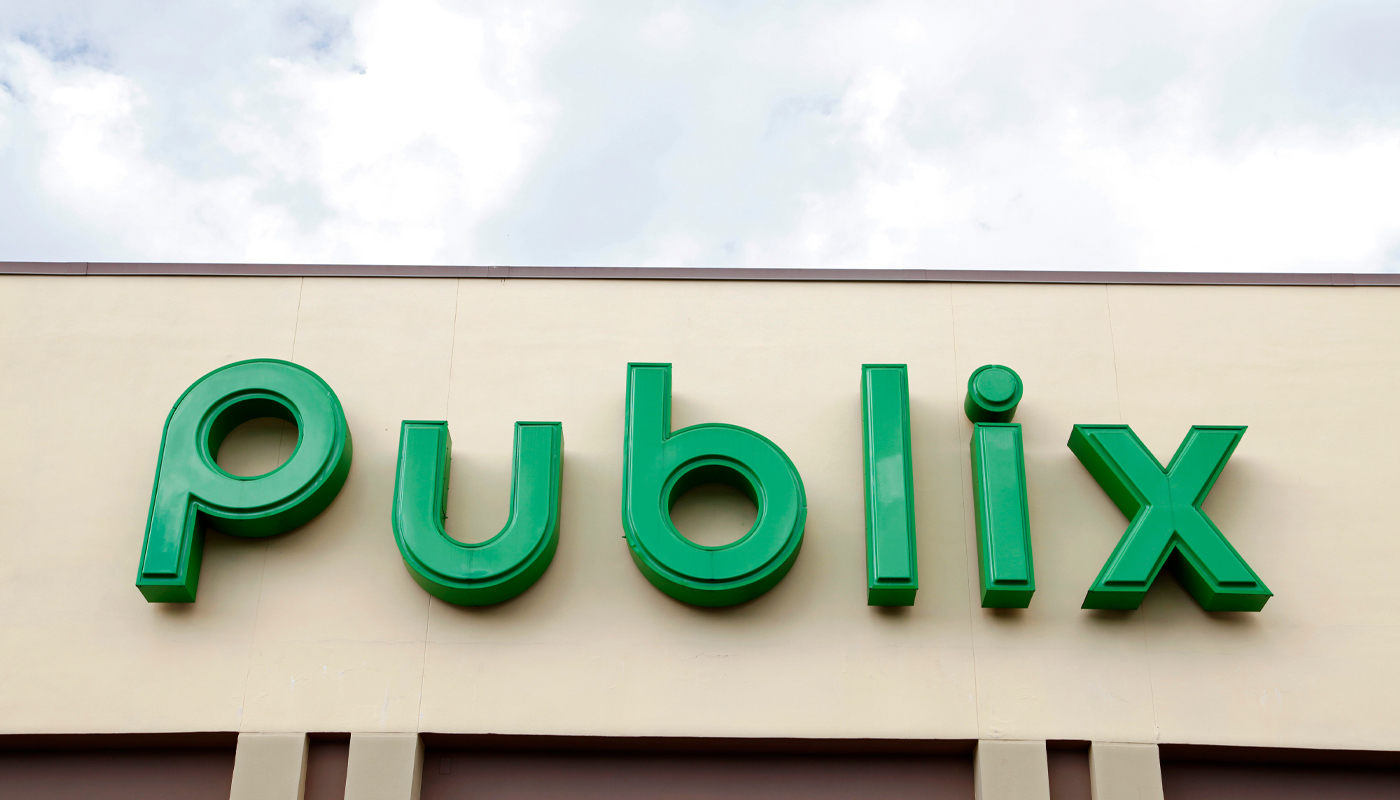 The Publix logo on a store front.
