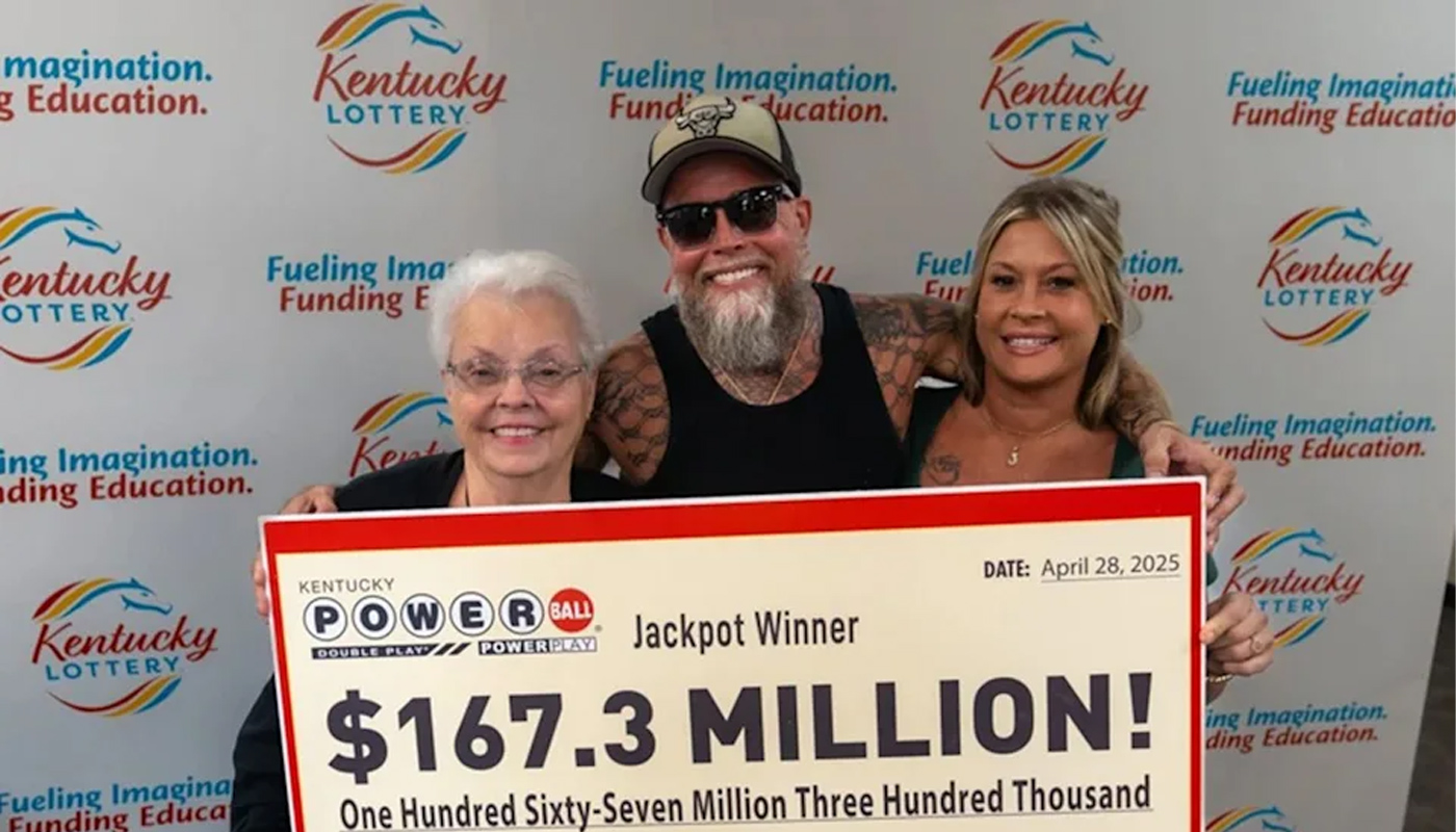 James Farthing holding his Kentucky Lottery check.