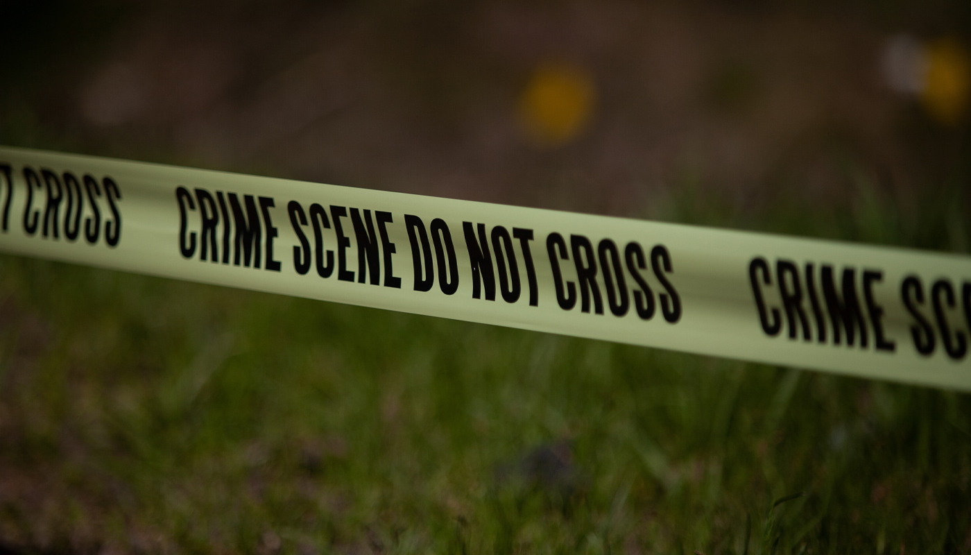 A police do not cross tape at a crime scene.